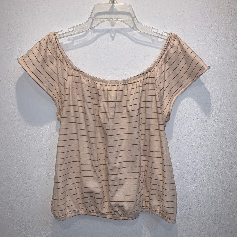 Off the shoulder tan and red striped shirt